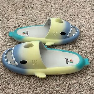 S-O-L-D. 
Palms Blue and Yellow Slip-On Slippers with Shark Design